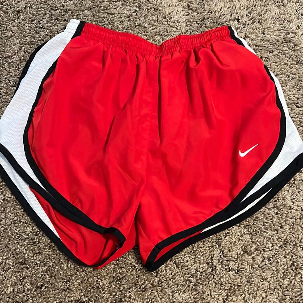 Red Nike shorts